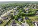 Beautiful aerial view of the neighborhood, featuring a pond and many landscaped yards at 45 Mill Cir, Clayton, NC 27527