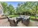 Backyard seating area on a wooden deck with ample seating for gatherings and relaxation at 45 Mill Cir, Clayton, NC 27527