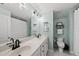 Bright bathroom featuring a double vanity, modern fixtures, and fresh design elements at 45 Mill Cir, Clayton, NC 27527
