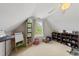 Bright bedroom featuring a vaulted ceiling, window, and ample storage for toys and games at 45 Mill Cir, Clayton, NC 27527