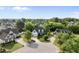 Charming two-story home with manicured lawn and mature trees, surrounded by well-kept neighborhood at 45 Mill Cir, Clayton, NC 27527