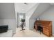 Cozy office space featuring unique angled ceilings and ample natural light at 45 Mill Cir, Clayton, NC 27527