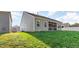 Lush backyard view of the home with green grass at 46 S Great White Way, Clayton, NC 27527
