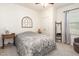 Cozy bedroom with neutral colors, carpeted floor, and a decorative window at 46 S Great White Way, Clayton, NC 27527