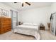 Bright bedroom featuring a comfortable bed, neutral decor, and ample natural light, perfect for relaxation at 46 S Great White Way, Clayton, NC 27527