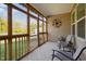 Inviting screened porch with seating, offering a relaxing outdoor space at 46 S Great White Way, Clayton, NC 27527