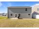 Large backyard is perfect for entertaining and features a patio with a grill for outdoor cooking at 473 Lavatera Dr, Wendell, NC 27591