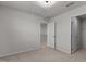 Bedroom featuring carpet, closet, and an ensuite bathroom at 473 Lavatera Dr, Wendell, NC 27591