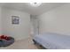 This bedroom is bathed in natural light and features a soft bed and comfortable beanbag at 473 Lavatera Dr, Wendell, NC 27591