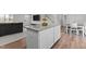 Open kitchen with granite island, stainless appliances, eat in breakfast area, and plenty of storage at 473 Lavatera Dr, Wendell, NC 27591