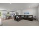 Spacious living room featuring neutral decor, an open floor plan, and plush seating at 473 Lavatera Dr, Wendell, NC 27591