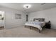 Comfortable main bedroom featuring carpeted floors, fan, and a walk-in closet at 473 Lavatera Dr, Wendell, NC 27591