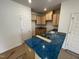 Bright kitchen features light wood cabinets, granite countertops, and stainless steel sink at 503 Eastwood St, Durham, NC 27703