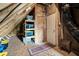 Unfinished attic storage with exposed beams and ample room for storage at 5209 Thistleby Rd, Fuquay Varina, NC 27526
