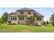 Well-maintained backyard with healthy green grass and manicured landscaping at 5209 Thistleby Rd, Fuquay Varina, NC 27526