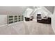 Attic bonus room offers extra living space and features a TV and furnishings at 5209 Thistleby Rd, Fuquay Varina, NC 27526