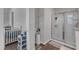Bathroom with a walk-in shower and a closet with shelving at 536 Gusty Ln, Zebulon, NC 27597