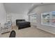 Large primary bedroom featuring high ceilings, neutral carpet, and a walk-in closet at 536 Gusty Ln, Zebulon, NC 27597