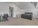 Spacious bedroom with a crib and views of ensuite bathroom at 536 Gusty Ln, Zebulon, NC 27597