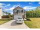 Charming two-story home featuring a two-car garage, stone accents, and a well-maintained front yard at 536 Gusty Ln, Zebulon, NC 27597