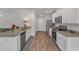 Kitchen featuring granite countertops, stainless steel appliances and white cabinets at 536 Gusty Ln, Zebulon, NC 27597