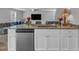 Spacious kitchen island featuring a stainless steel dishwasher and granite countertop at 536 Gusty Ln, Zebulon, NC 27597