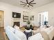 Inviting living space with a fireplace, built-in cabinets, and a comfortable seating arrangement at 602 Shelley Rd, Raleigh, NC 27609