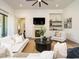 Comfortable living area with a fireplace, built-in shelving, and a neutral color palette for relaxation at 602 Shelley Rd, Raleigh, NC 27609