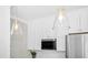 Contemporary kitchen showcasing white cabinets, stainless steel appliances, and stylish pendant lighting at 607 Smedes Place # B, Raleigh, NC 27605