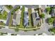 Aerial view of home with solar panels, fenced yard, and manicured lawn at 704 Moonbeam Dr, Raleigh, NC 27603
