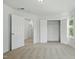 Bedroom with open closet and view to the next room at 704 Moonbeam Dr, Raleigh, NC 27603