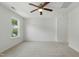 Bedroom featuring neutral carpet, ceiling fan, and natural light at 704 Moonbeam Dr, Raleigh, NC 27603