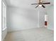 Bedroom with carpet, ceiling fan, and a window at 704 Moonbeam Dr, Raleigh, NC 27603