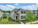 The exterior view of this two-story home showcases its classic architecture, well-maintained yard, and inviting entrance at 704 Moonbeam Dr, Raleigh, NC 27603