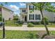 A lovely two-story home with a manicured front yard and classic black shutters at 704 Moonbeam Dr, Raleigh, NC 27603