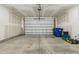 A two car garage with an automatic door and raw drywall ready for finishing touches at 704 Moonbeam Dr, Raleigh, NC 27603