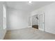 Carpeted office space with glass paneled doors and bright natural light at 704 Moonbeam Dr, Raleigh, NC 27603