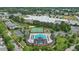 A lovely community pool and park area with a clubhouse, tennis courts, and playground, perfect for Gathering fun at 704 Moonbeam Dr, Raleigh, NC 27603
