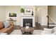 Inviting living room features a cozy fireplace, stylish decor, and an open layout at 7229 Terregles Dr, Raleigh, NC 27617
