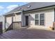 A backyard deck features a wooden floor and access to the home's back door at 7940 Milltrace Run, Raleigh, NC 27615