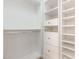 Walk-in closet with custom shelving and ample storage space at 7940 Milltrace Run, Raleigh, NC 27615