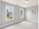 Bedroom with carpet, natural lighting, and a neutral color scheme at 84 N Hadrian Ct, Clayton, NC 27520