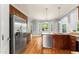 Modern kitchen featuring stainless steel appliances and granite countertops at 84 N Hadrian Ct, Clayton, NC 27520