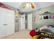 Well-organized bedroom with a closet, wall decor and convenient access to adjacent rooms at 8401 Hobhouse Cir, Raleigh, NC 27615