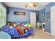 Bright bedroom with playful decorations and a cozy bed at 8401 Hobhouse Cir, Raleigh, NC 27615