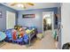 Charming bedroom with cozy twin bed and open doorway to study room at 8401 Hobhouse Cir, Raleigh, NC 27615