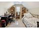 Inviting bedroom featuring a work space with a desk and a comfortable rocking chair at 8401 Hobhouse Cir, Raleigh, NC 27615