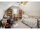 Inviting bedroom featuring a work space with a desk and a comfortable rocking chair at 8401 Hobhouse Cir, Raleigh, NC 27615