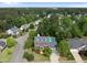 Aerial view of a well-maintained home with a pool and lush landscaping at 101 Conway Ct, Cary, NC 27513