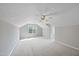 Bedroom features a ceiling fan, neutral walls, and a window offering natural light at 101 Conway Ct, Cary, NC 27513